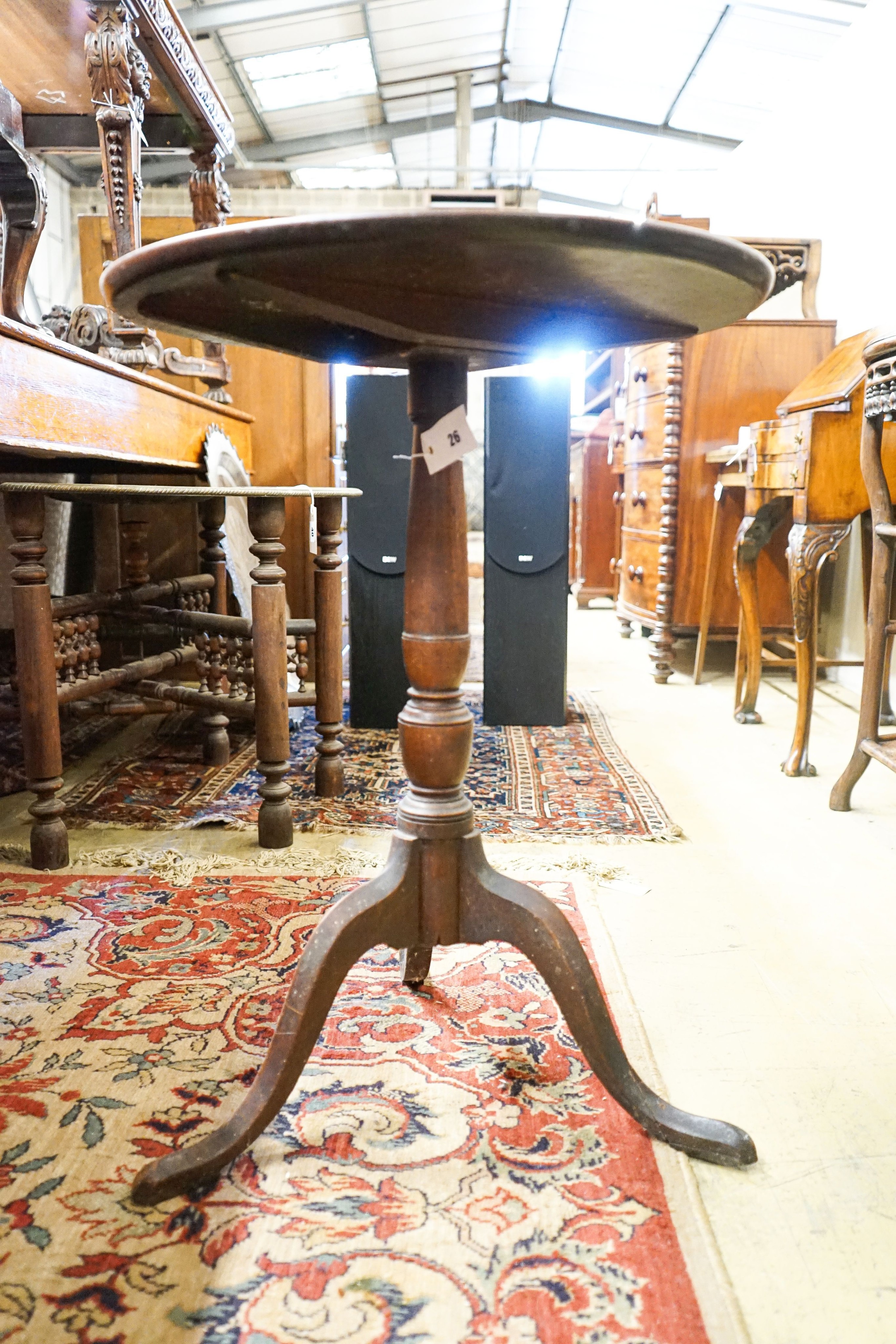 A George III mahogany tilt top tripod table, diameter 53cm, height 71cm